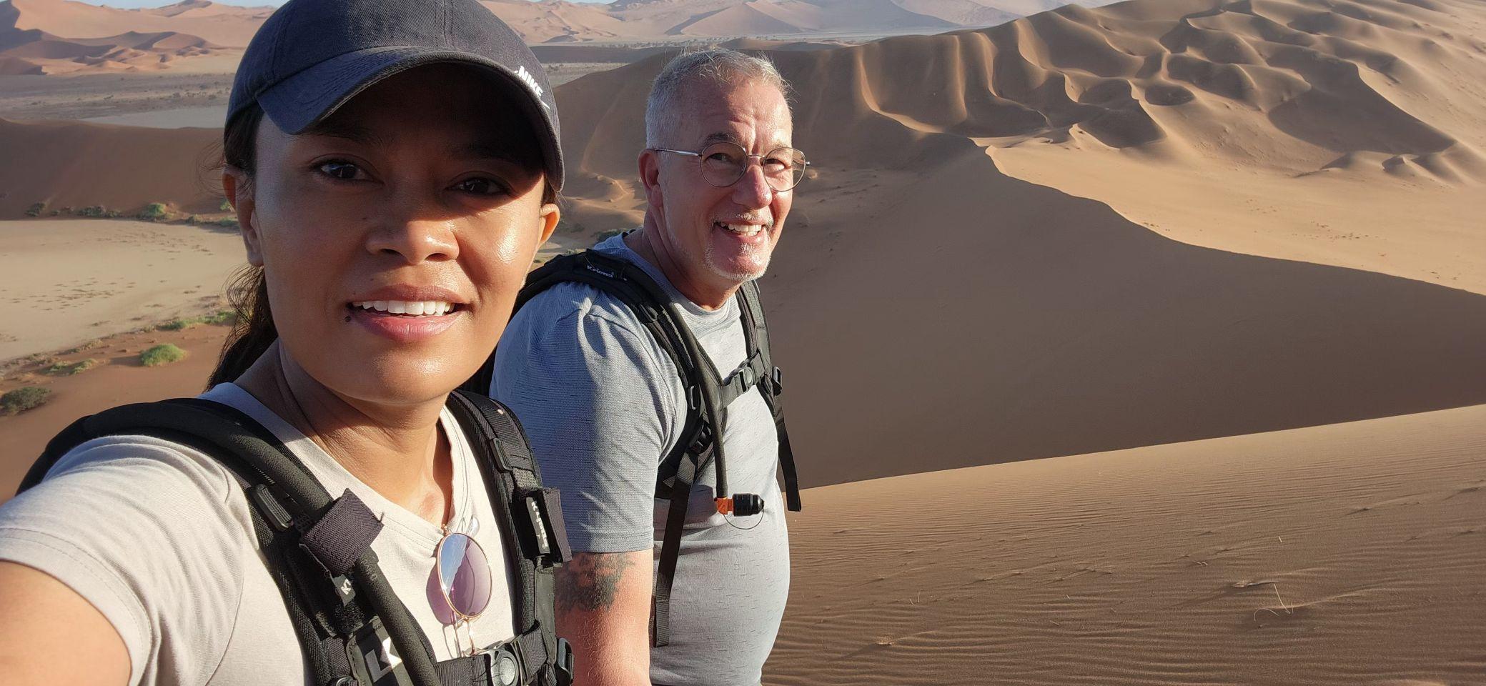 Eddy and Max pause partway up Big Daddy Dune, the Namib stretching out behind them.